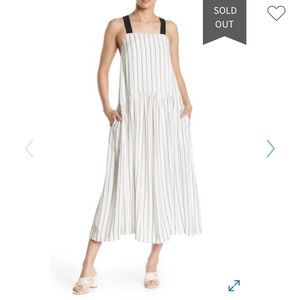 Melloday midi white dress with pockets.